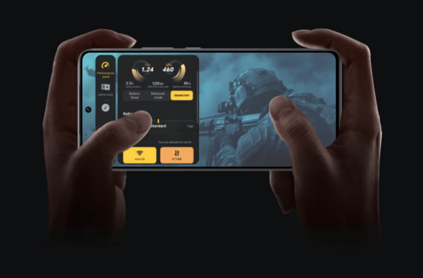 ภาพโทรศัพท์มือถือกำลังเล่นเกมและเปิด Performance Panel พร้อมโหมด Monster เพื่อเปรียบเทียบว่า iQOO vs realme รุ่นไหนดี