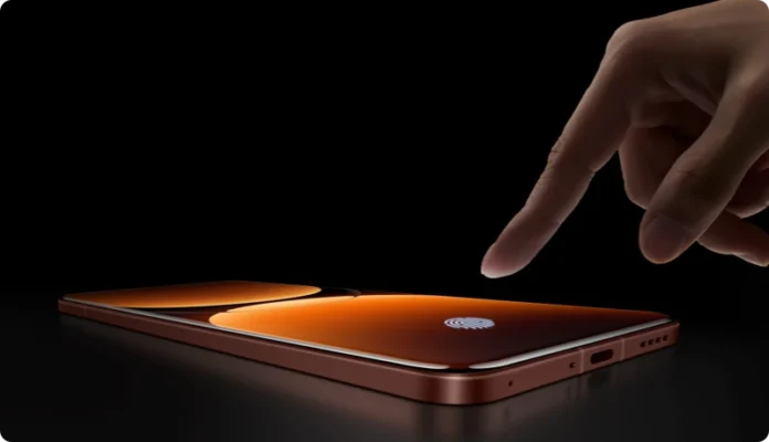 ภาพสมาร์ทโฟนสีน้ำตาลแดงวางแนวนอน มีนิ้วกำลังแตะบนหน้าจอเพื่อใช้ฟังก์ชันสแกนลายนิ้วมือใต้จอ เปรียบเทียบฟีเจอร์ของรุ่น POCO F7 Ultra vs realme GT 7 Pro