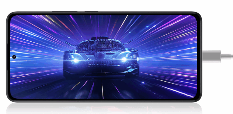 รูปหน้าจอสมาร์ทโฟน Redmi แสดงภาพรถสปอร์ตสีดำกำลังพุ่งไปข้างหน้าอย่างรวดเร็ว พร้อมมีสายชาร์จเสียบอยู่ด้านข้าง เหมาะสำหรับบทความ วิธีดูสเปกมือถือ Redmi ก่อนซื้อ